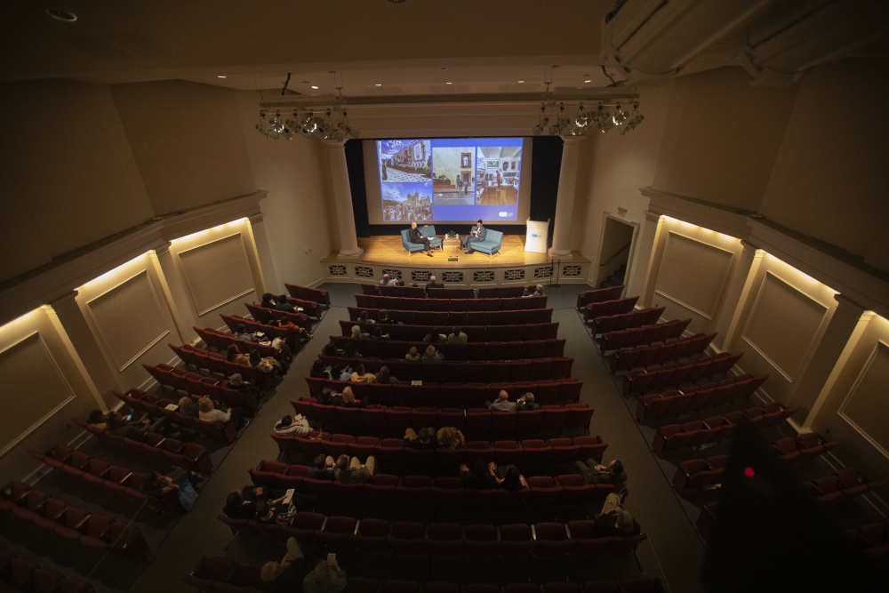 Kaufman Theater with people in audience.