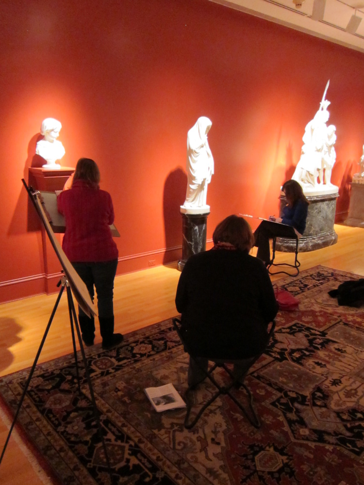 People drawing in galleries