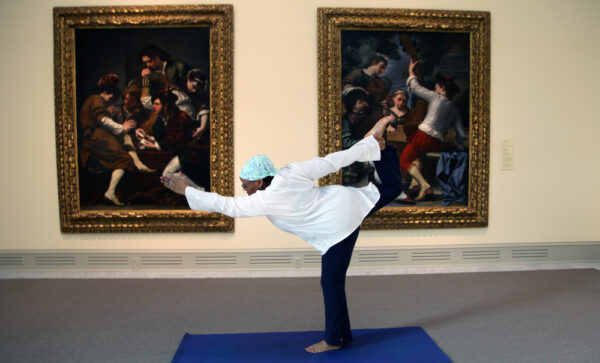 Yoga Instructor in front of painting
