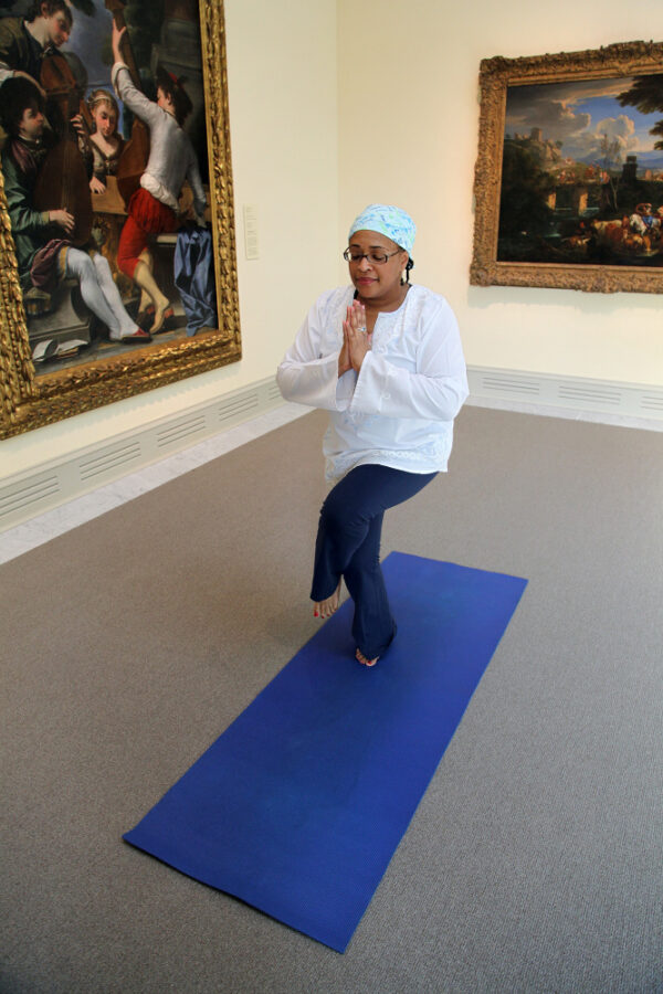 Yoga in front of artwork