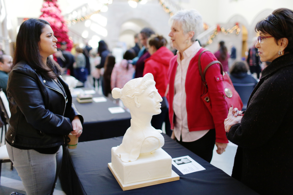 Crowd at the 2022 Bake Off. Cake in form of a bust