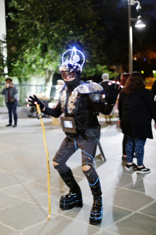 Man celebrating Neon Festival in costume