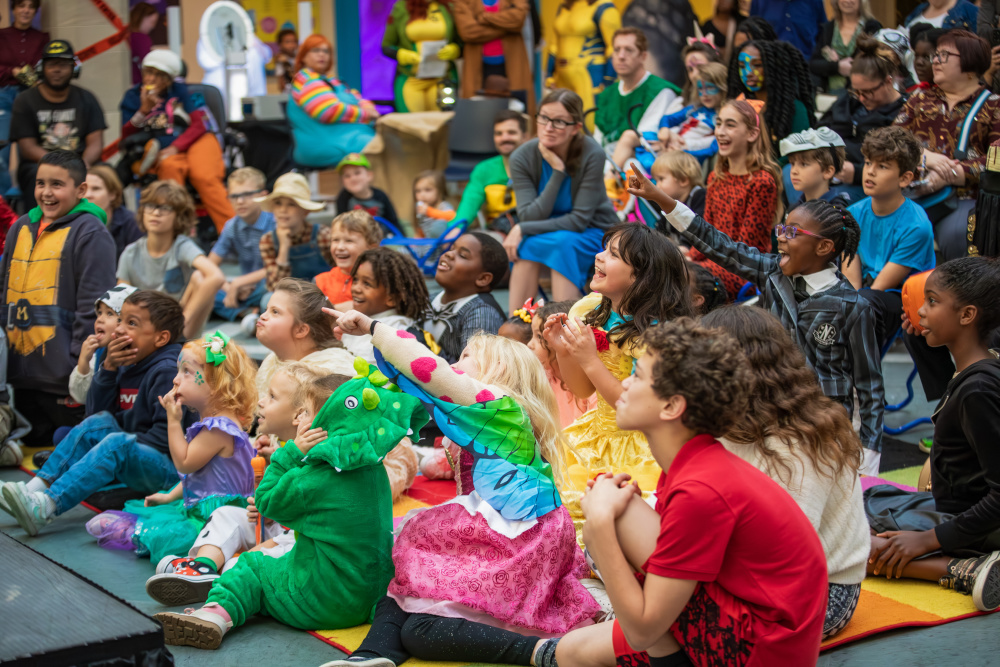 Children listening to performance