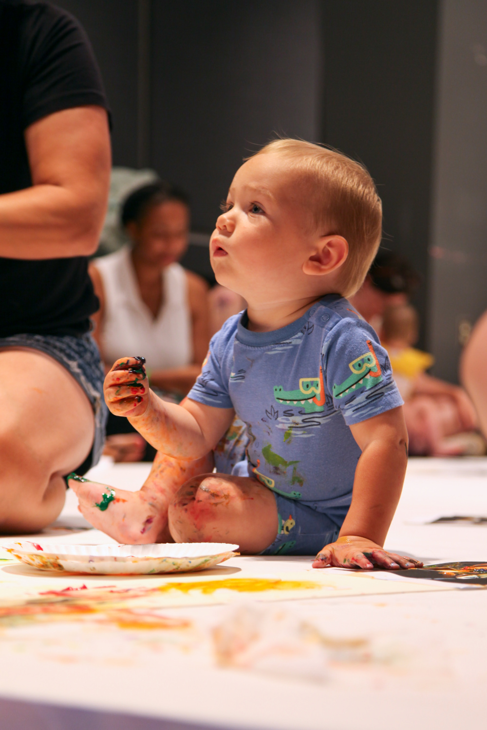 Baby playing in gallery