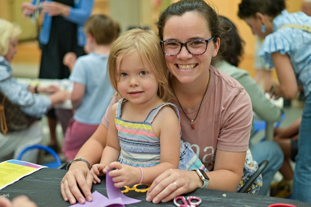 Wonder Wednesday Participants smiling at the camera and making art