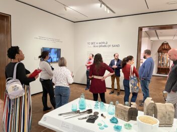 A group of teachers on a tour of the glass galleries.