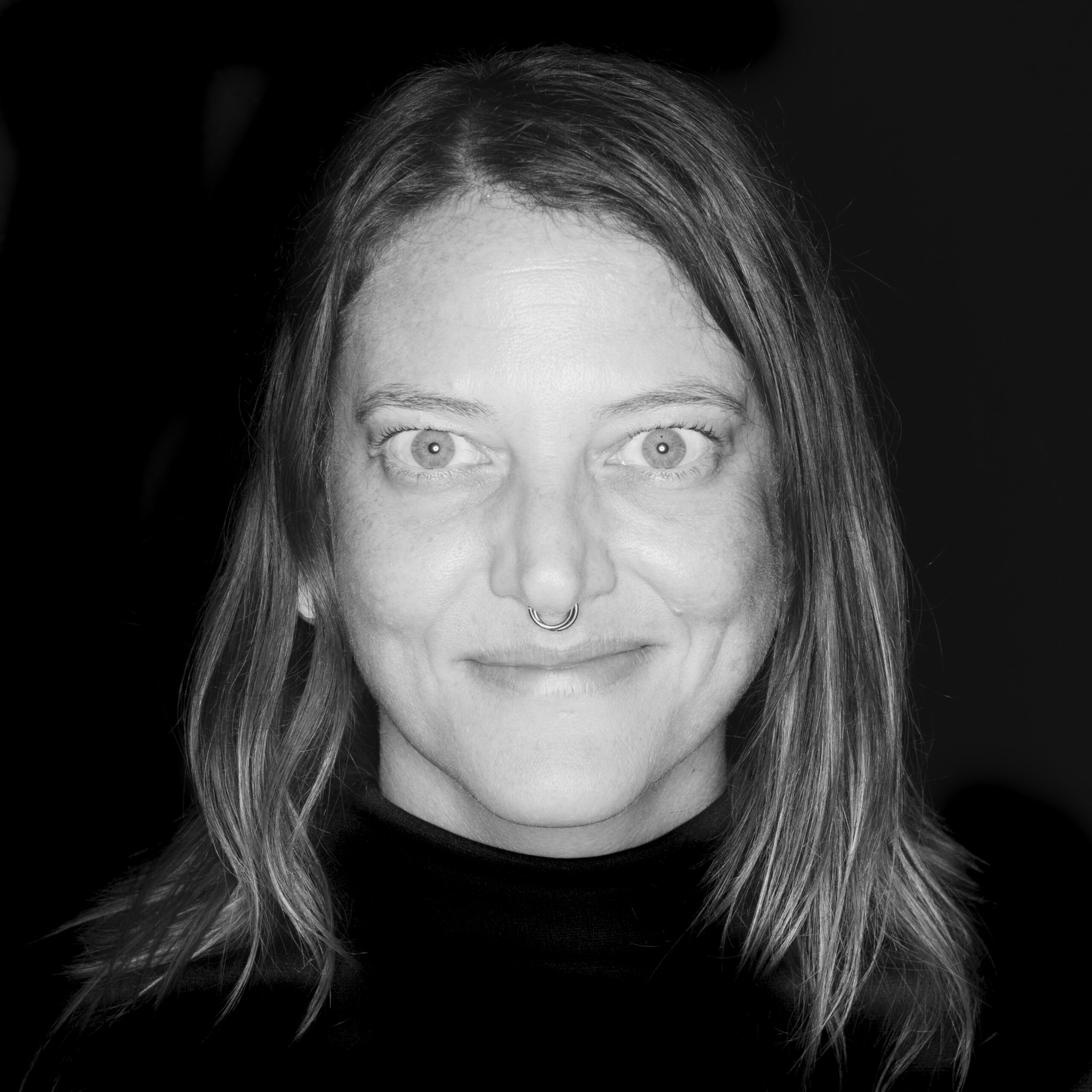 Lori Weaver - Headshot with Black Background