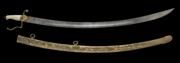 Curved sword with a steel blade elaborately decorated
