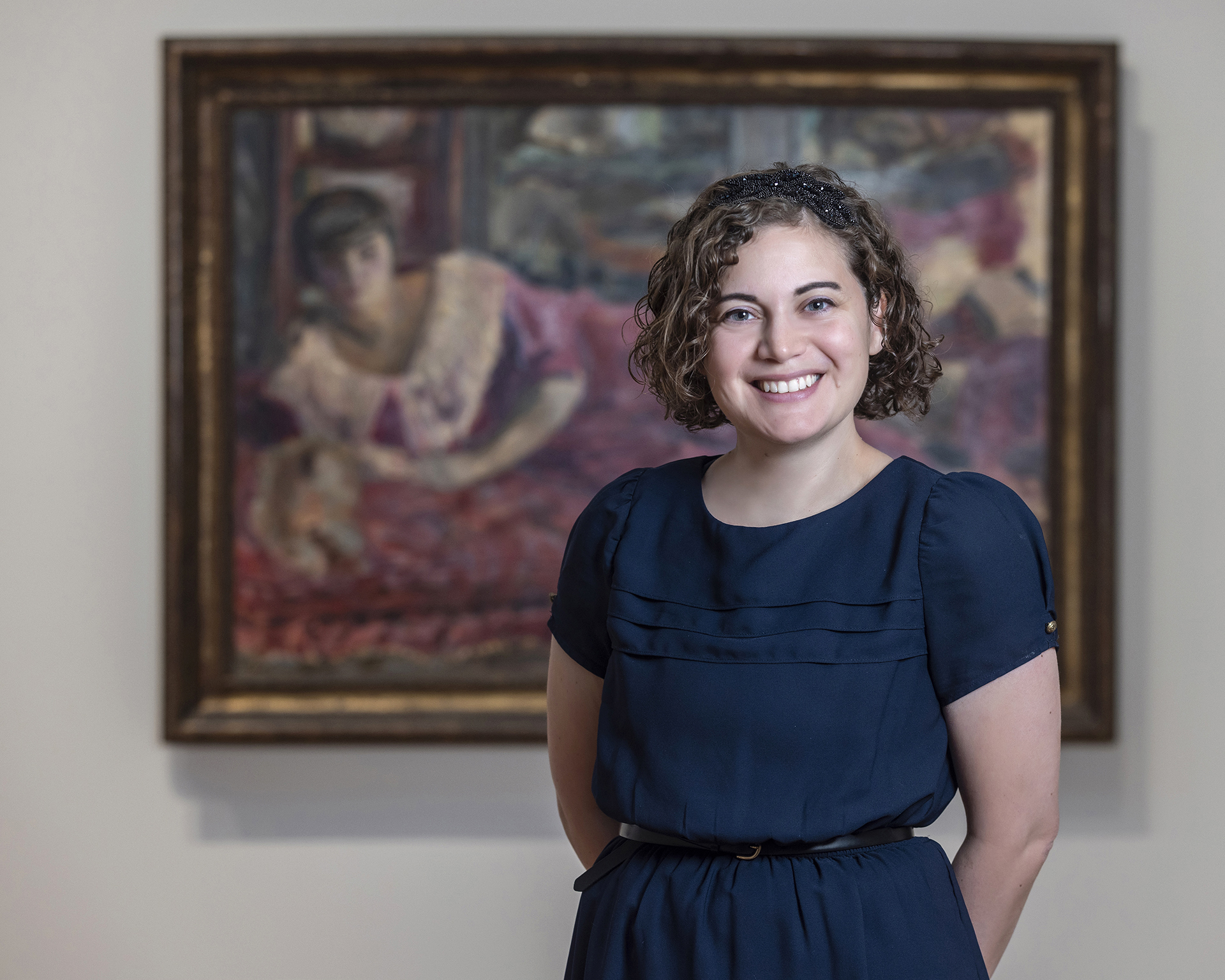 Mia Laufer in front of painting