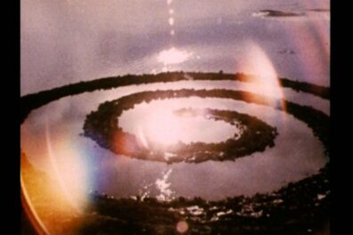 Film still showing land artist Robert Smithson's 'Spiral Jetty,' a pathway of rock and earth forming a spiral in the basin of Utah’s Great Salt Lake.