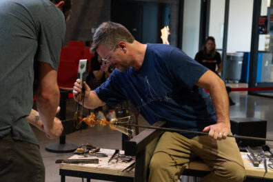 Jeff Mack demonstrates glassmaking at the Perry Glass Studio.