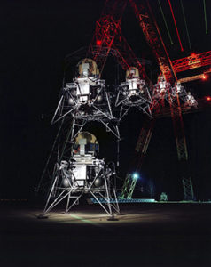 This multiple exposure shows a simulated Moon landing of the Lunar Excursion Module simulator/trainer at Langley's Lunar Landing Research Facility